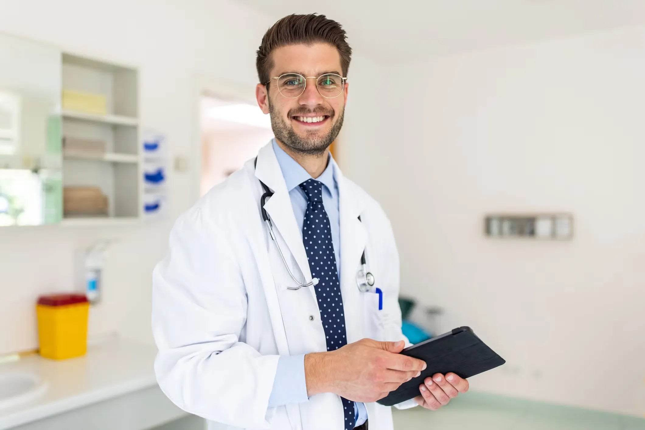 files/portrait-of-a-happy-young-doctor-in-his-clinic-royalty-free-image-1661432441.webp